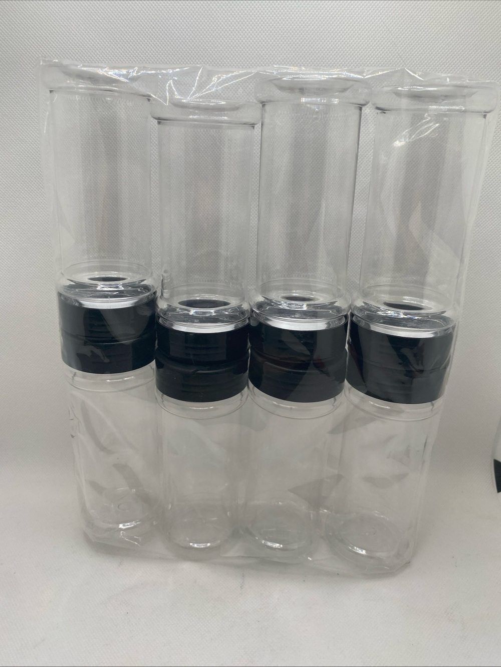 Set of 8 Clear Bottles with Black Shaker Lids
